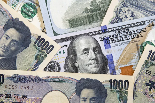 depositphotos_51333165-stock-photo-american-dollars-and-yens-concept.jpg