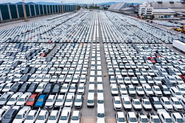 depositphotos_599553406-stock-photo-rows-new-cars-automotive-line.jpg