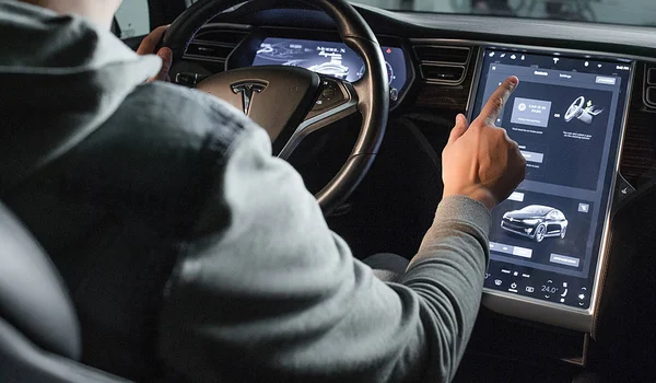 Tesla Stock; Gains As AI And Robotics Bets Add $40.5 Billion In Value