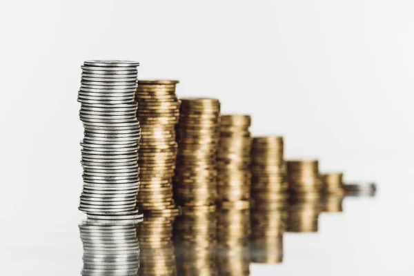 depositphotos_316713938-stock-photo-selective-focus-stacked-silver-golden.jpg