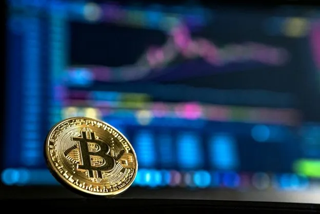 Bitcoin holds above $77,000