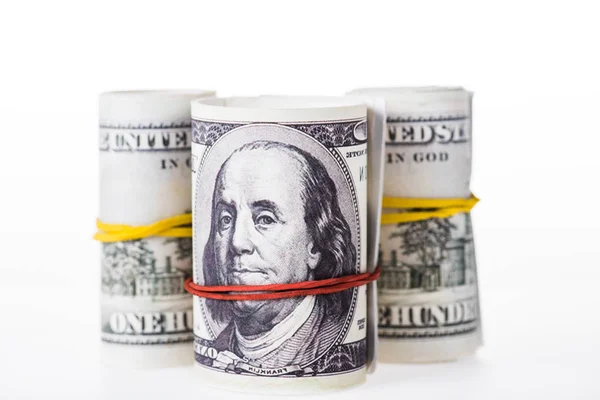 depositphotos_192431162-stock-photo-close-view-rolled-dollar-banknotes.jpg