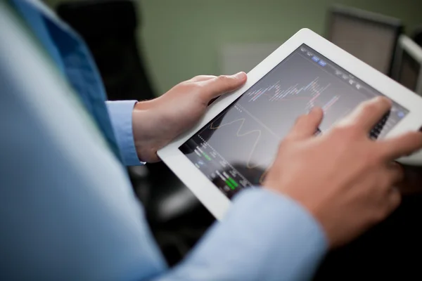 depositphotos_12506489-stock-photo-businessman-with-tablet.jpg