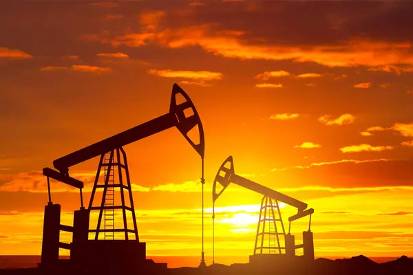depositphotos_696510830-stock-photo-silhouette-oil-rigs-sunset-machine.jpg