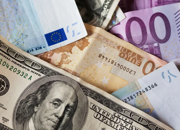 depositphotos_64320761-stock-photo-dollar-and-euro-notes.jpg