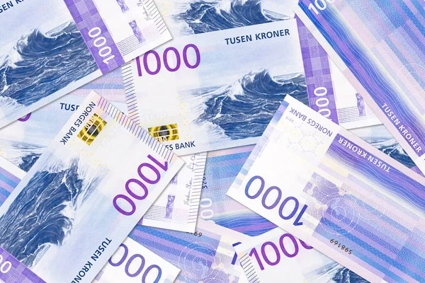 depositphotos_367033382-stock-photo-many-new-1000-norwegian-krone.jpg
