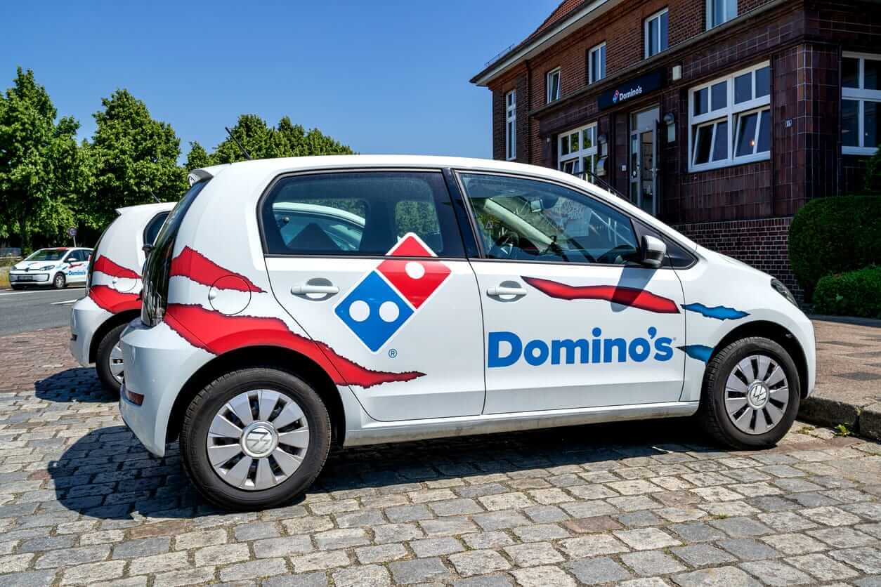 Dominos Pizza Inc delivery by- Bjoern Wylezich via iStock