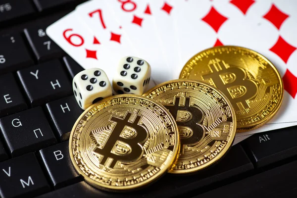 depositphotos_219707370-stock-photo-bitcoins-cards-dices-keyboard-cryptocurrencie.jpg