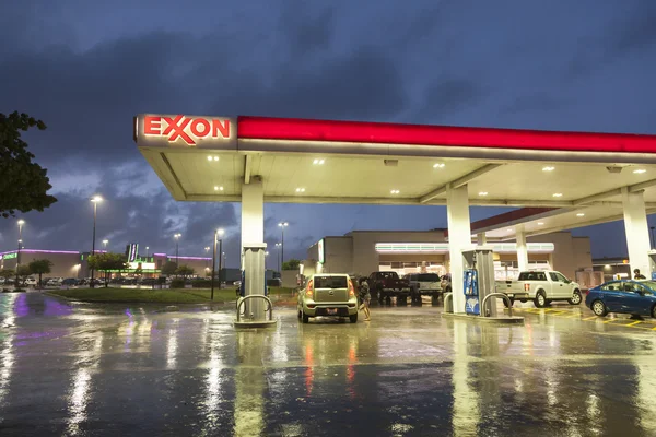 depositphotos_115491944-stock-photo-exxon-gas-station-at-night.jpg