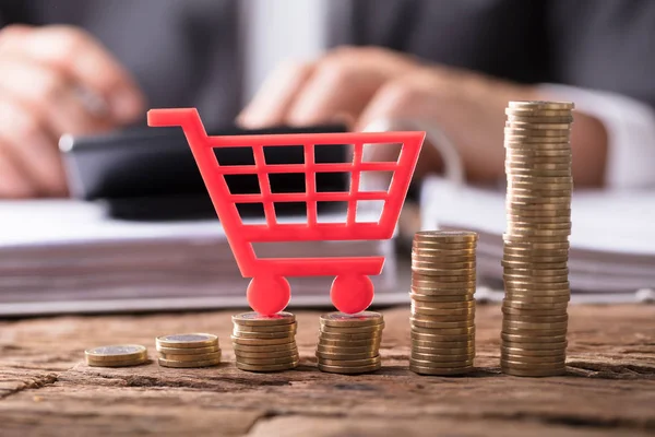 depositphotos_187467658-stock-photo-close-red-shopping-cart-stacked.jpg