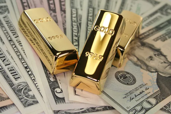 depositphotos_4916104-stock-photo-three-large-gold-bars-many.jpg