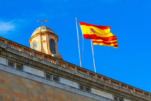 depositphotos_726921744-stock-photo-spanish-flag-situated-building-rooftop.jpg