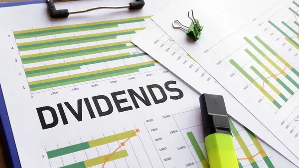 depositphotos_727095196-stock-photo-dividends-shown-financial-charts-dividend.jpg