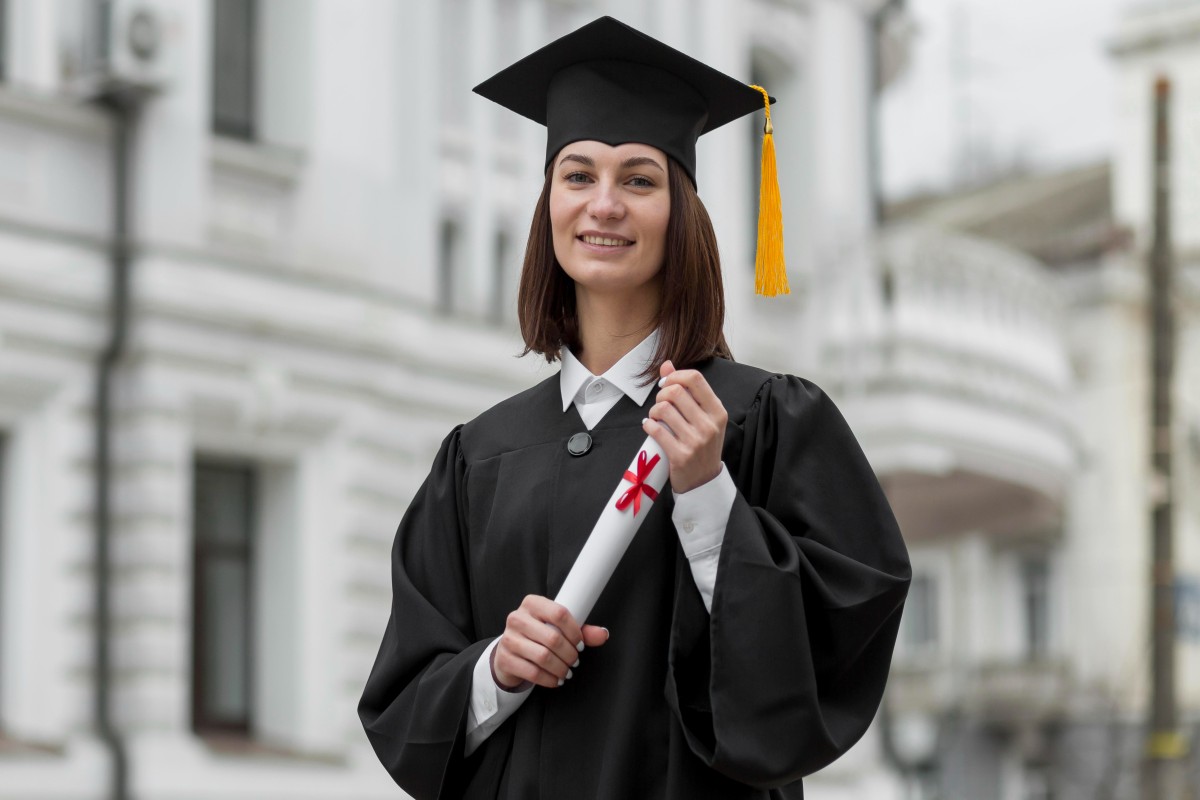 medium-shot-graduate-student-with-diploma (1).jpg