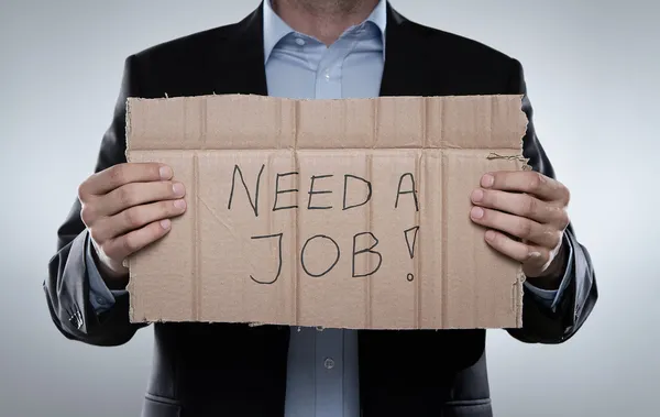 depositphotos_10058305-stock-photo-fired-businessman-looking-for-a.jpg