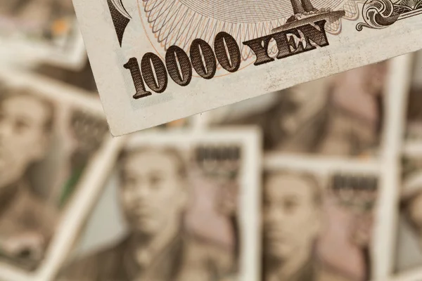 depositphotos_8421435-stock-photo-japanese-yen-bills-money-from.jpg