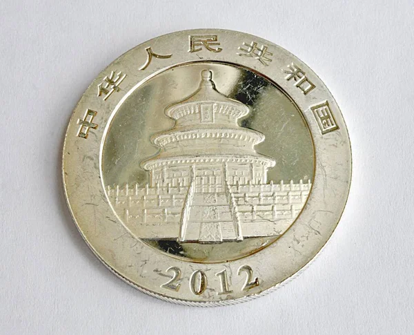 depositphotos_374095858-stock-photo-detail-view-china-silver-coin.jpg