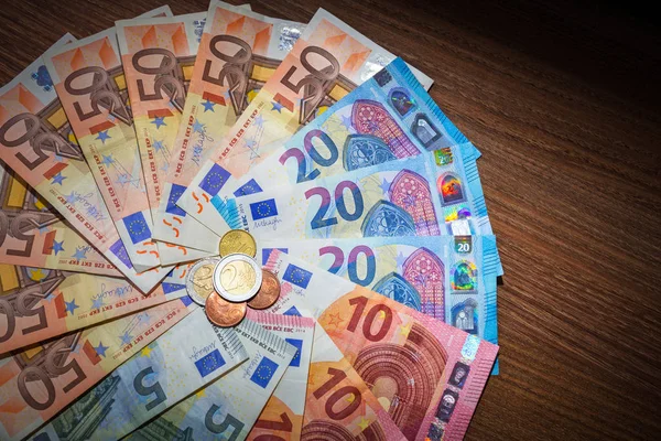 depositphotos_147847509-stock-photo-euro-banknotes-and-coins.jpg