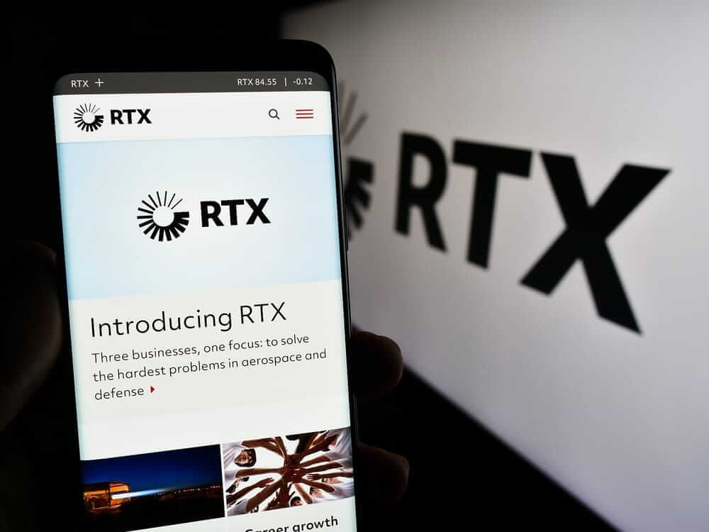 RTX Corp website on phone and logo-by T_Schneider via Shutterstock