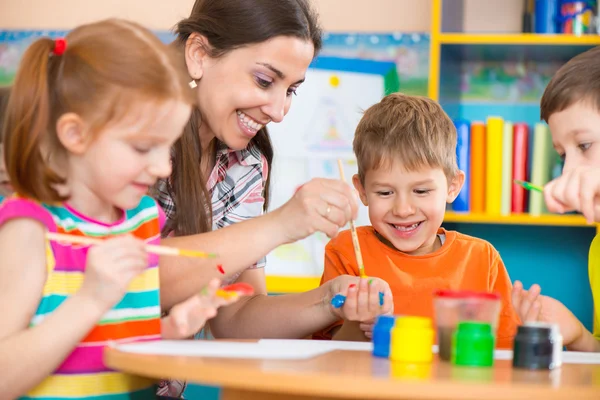 depositphotos_46644109-stock-photo-cute-children-drawing-with-teacher.jpg depositphotos_46644109-stock-photo-cute-children-drawing-with-teacher.jpg